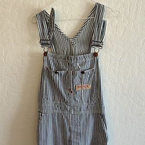 A vintage pair of Big Mac striped conductor overalls.
Brass hardware & buttons.
